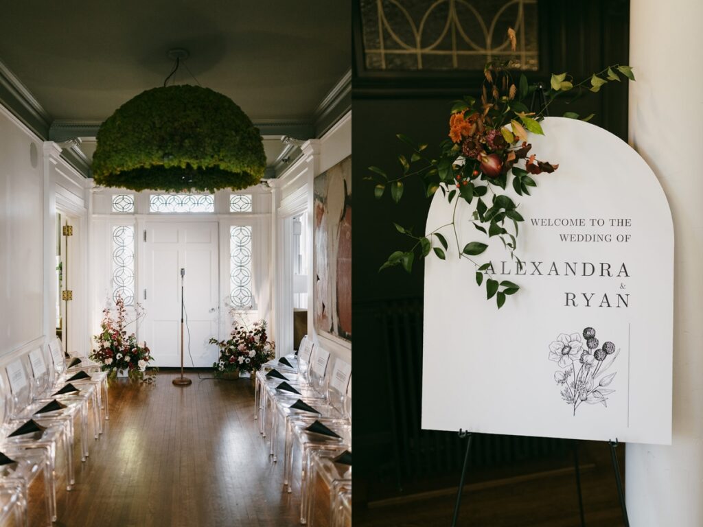 Left: Indoor ceremony setup with clear chairs, floral arrangements, and greenery installation overhead. Right: Welcome sign reading “Alexandra & Ryan” with floral accents at the venue entrance.