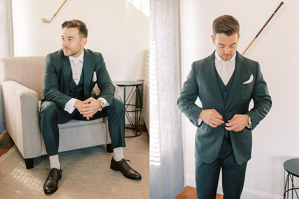 Groom in a dark green suit sitting in a chair and adjusting his jacket during wedding day preparations.