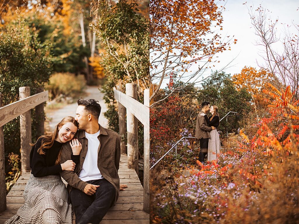 Couple sitting together on wooden bridge and standing among colorful fall foliage and flowers in garden engagement photos.